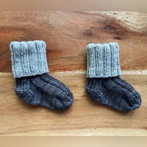 Last chance! 
Hand knit Baby Socks—that will actually stay on your baby’s feet!
